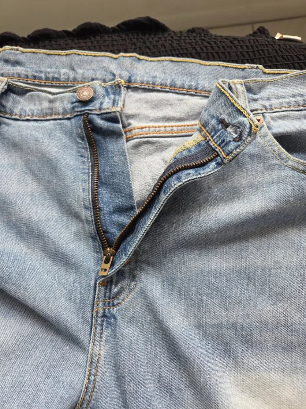 Levi’s 505 men’s regular fit straight leg jeans in a light blue wash